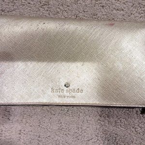 Kate Spade gold bi-fold long wallet